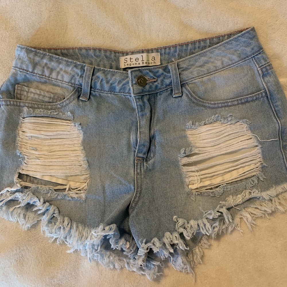 STELLA Light Washed Ripped Jean Shorts